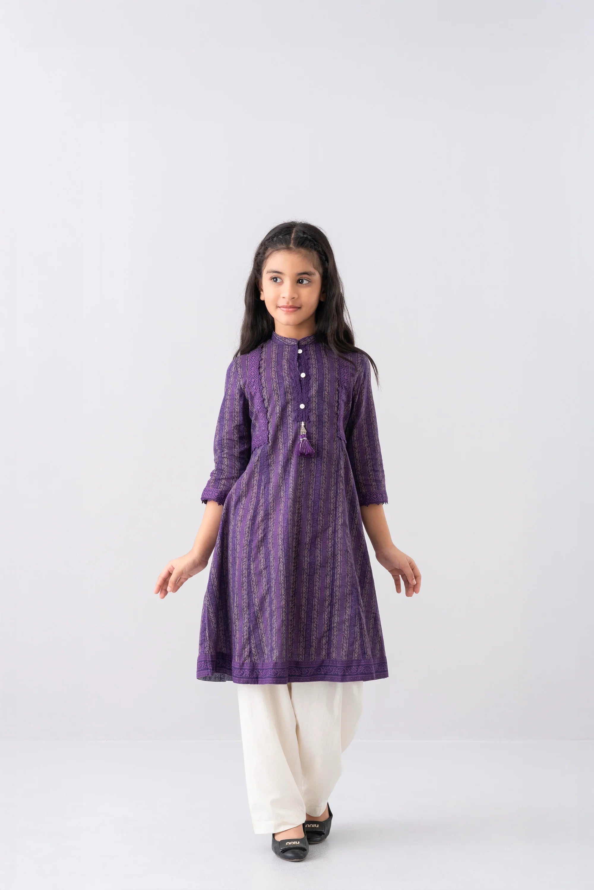 Girls' ethnic top with traditional embroidery and vibrant colors